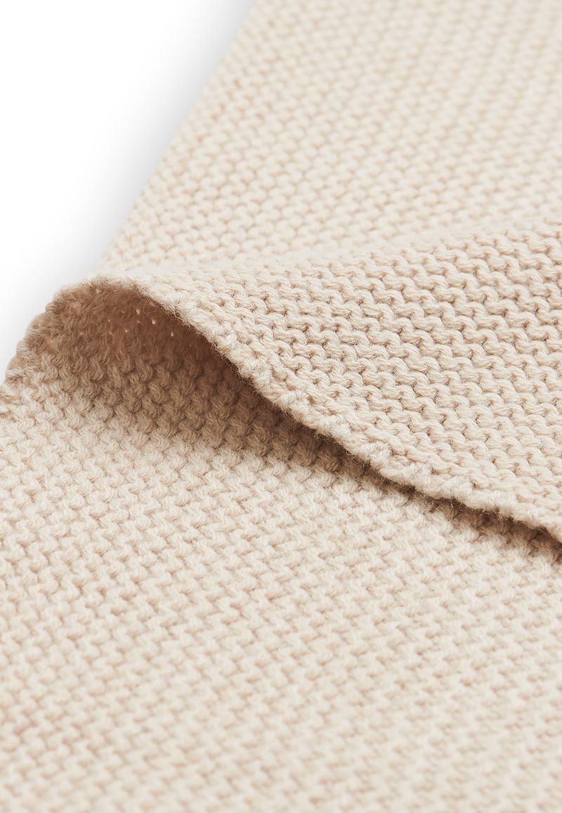 Tricoting couverture beige