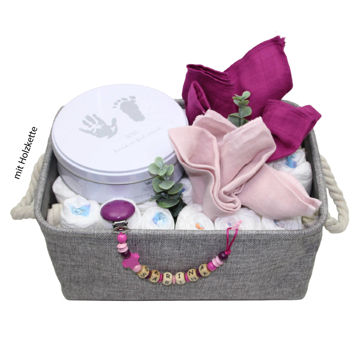 Geschenkkiste mit Windeln, einer Nuggikette und Abdruckset in rosa