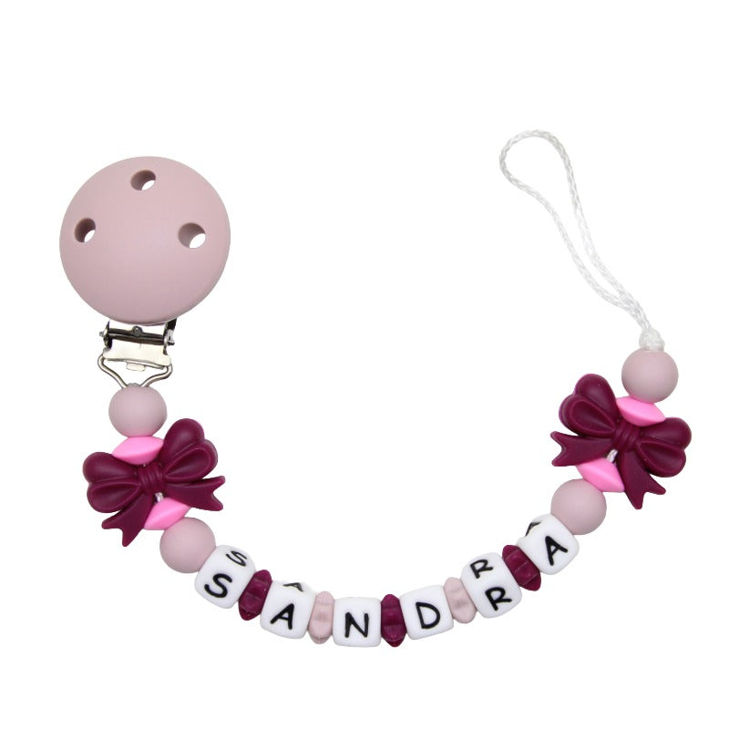 Silicone pacifier chain with name bow rose brown:red wine