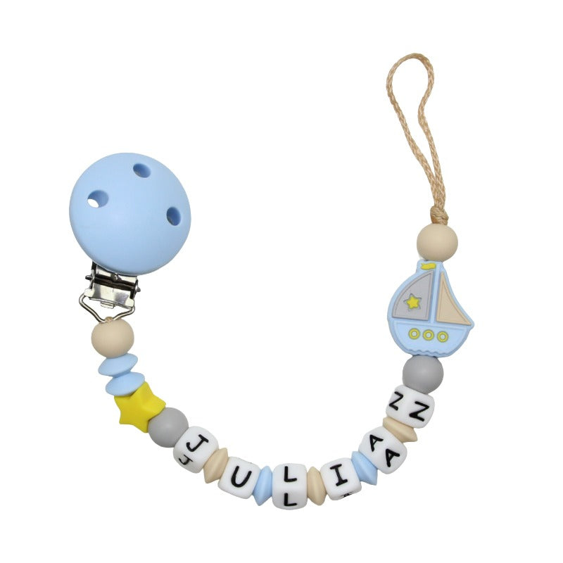Nuggikette Silicone avec nom Shiling Ship pastel bleu